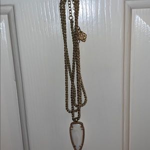 Long gold Kendra scott necklace